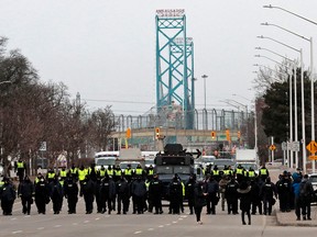 Ambassador Bridge Reopens Following Removal of Protesters, Highlighting COVID-19 Concerns